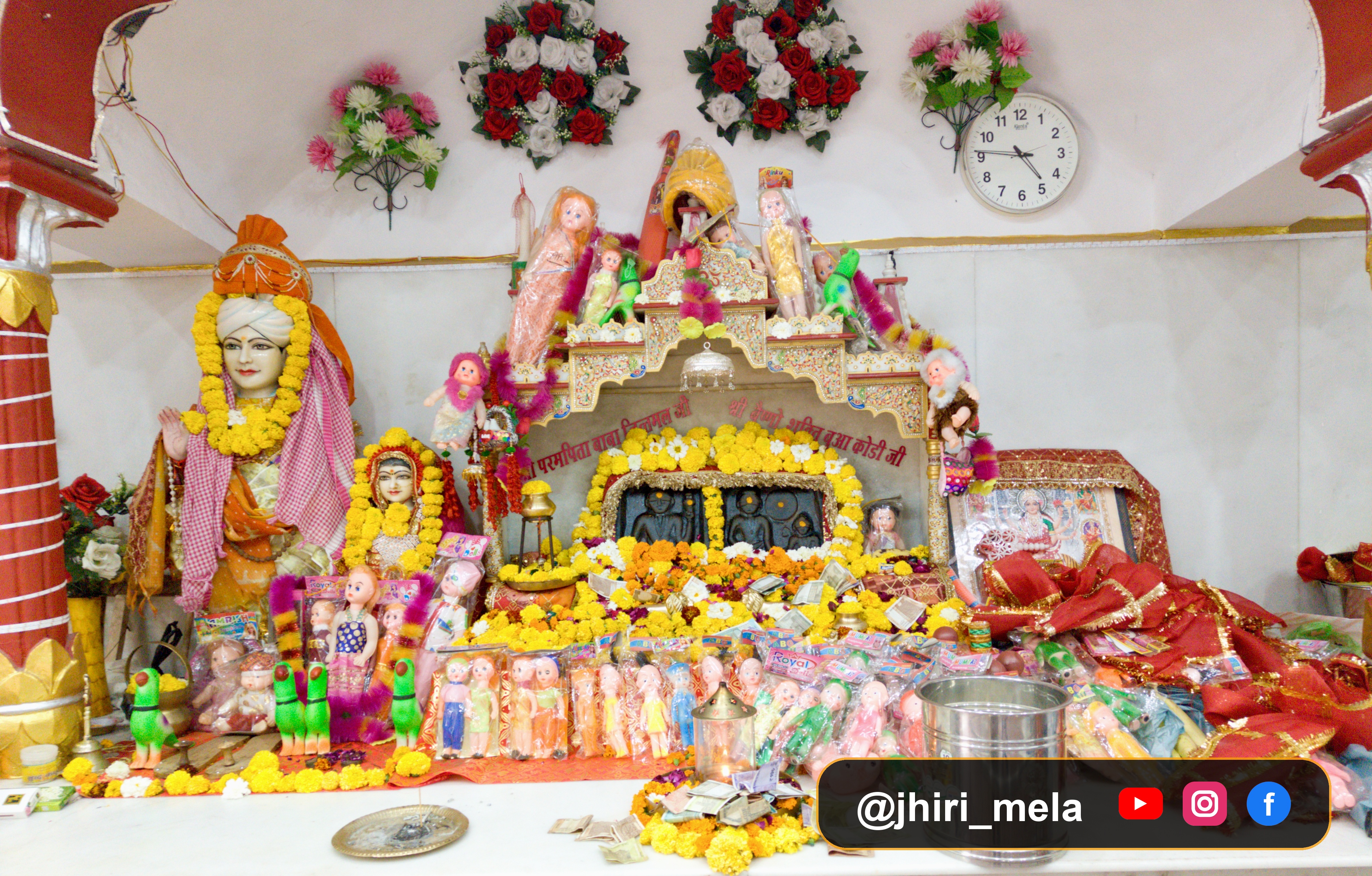 Ancient Sanctum Altar with Murtis & Sacred Offerings at Aghar Jitto — अघार जित्तो गर्भगृह — प्राचीन विग्रह, पुष्प सज्जा एवं पारंपरिक भेंट | Aghar Jitto, Reasi